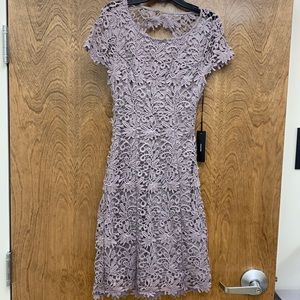 Lulu’s gray dress, never worn